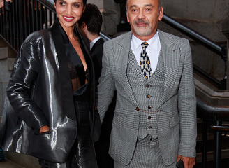 Christian Louboutin attends New York Fashion Week in a three piece suit